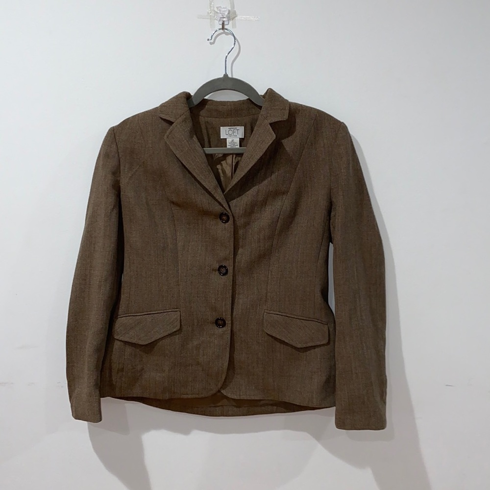 Brown Blazer with pockets.